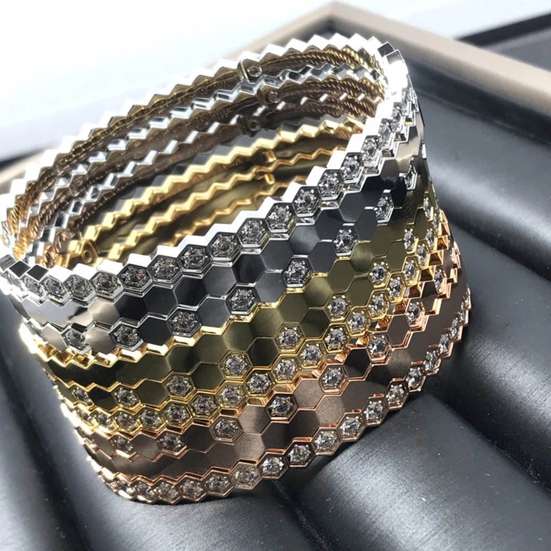 

Fashionable french couple bracelet. Honeycomb rhombus design high quality titanium steel material. beautiful gift