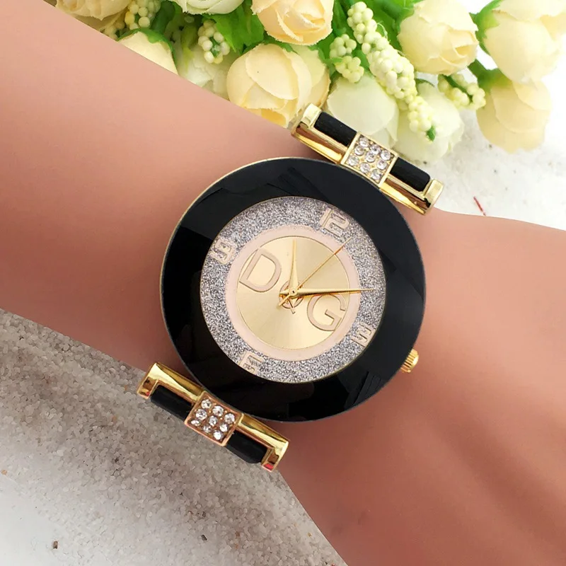 DQG hot selling simple black and white quartz women's watch, minimalist design silicone strap watch, large dial, fashion creativ