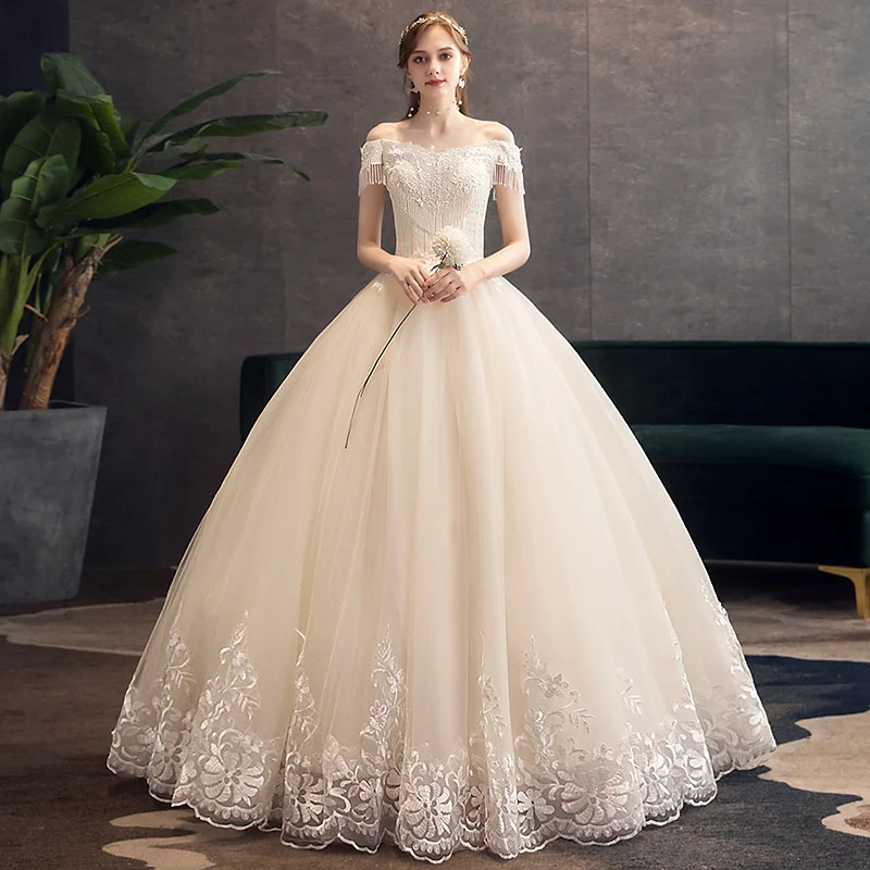 

Wedding Dress 2023 New Bride Slim Down With Tail Champagne Long Sleeve Main Wedding Dress