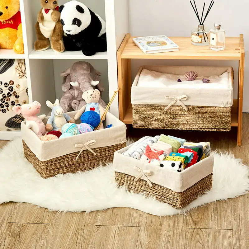 

Sturdy Woven Seagrass Nesting Shelf Storage Baskets Container Bins with 3 Removable Liners - Practical Multi-Purpose Set of 3.