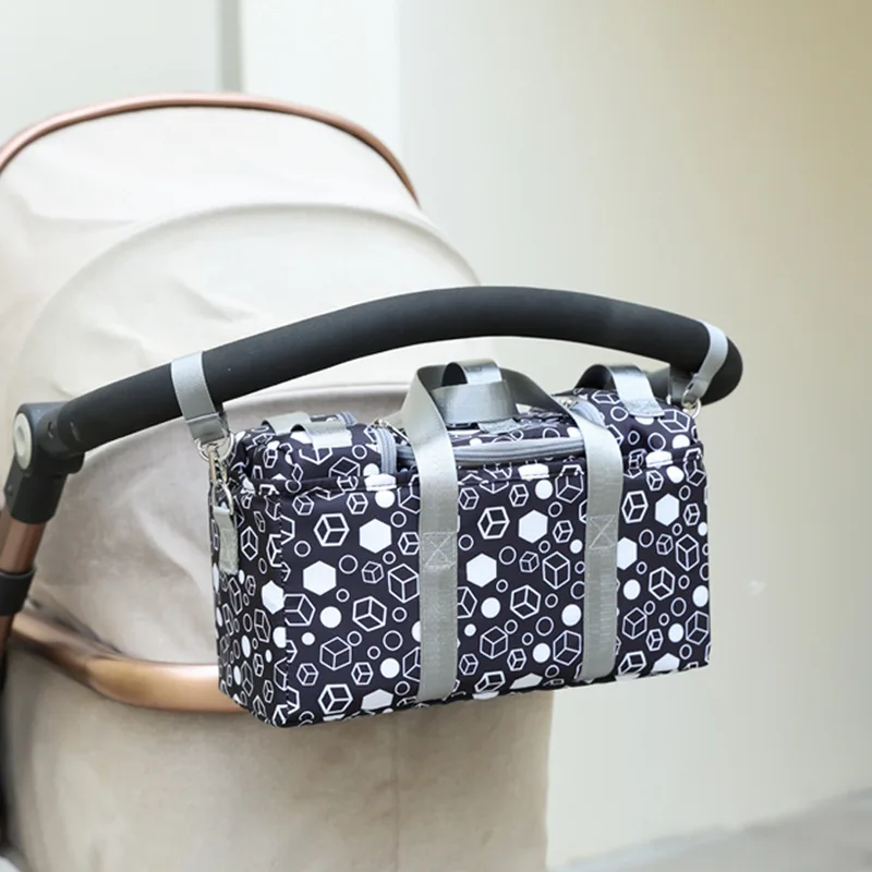 The new stroller hanging bag is a 5-piece multi-function detachable hand diaper bag cross-border mommy bag