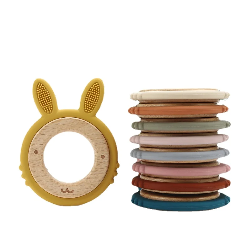 

1PC Cute Rabbit Wooden Silicone Baby Teether Ring Hand Teething Rattle Toddler Chew Play Gifts Baby Toys For Biting Comfort