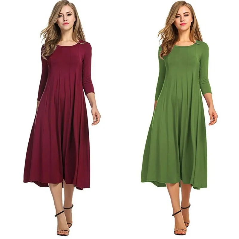

Autumn new round neck middle sleeve solid color big hem dress