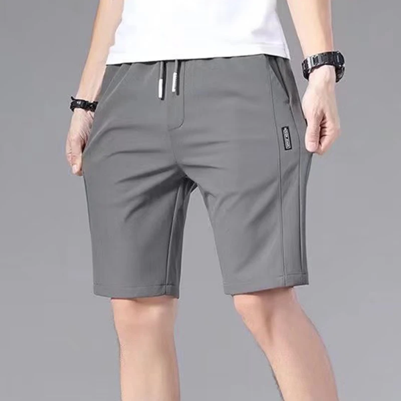 

2022 Zomer Heren Sport Shorts Effen Kleur Straight Patroon Losse Soort Elastische Taille Trekkoord Casual Shorts Jogging Broek