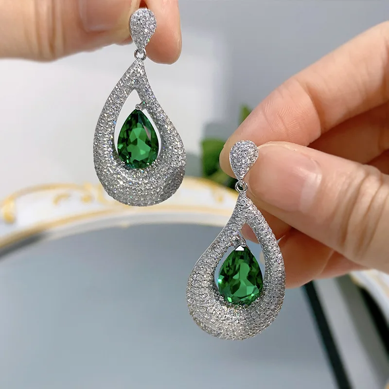 

2023 new live broadcast hot model luxury inlaid full diamond 9 * 13mm imitation Emerald European and American ear stud female