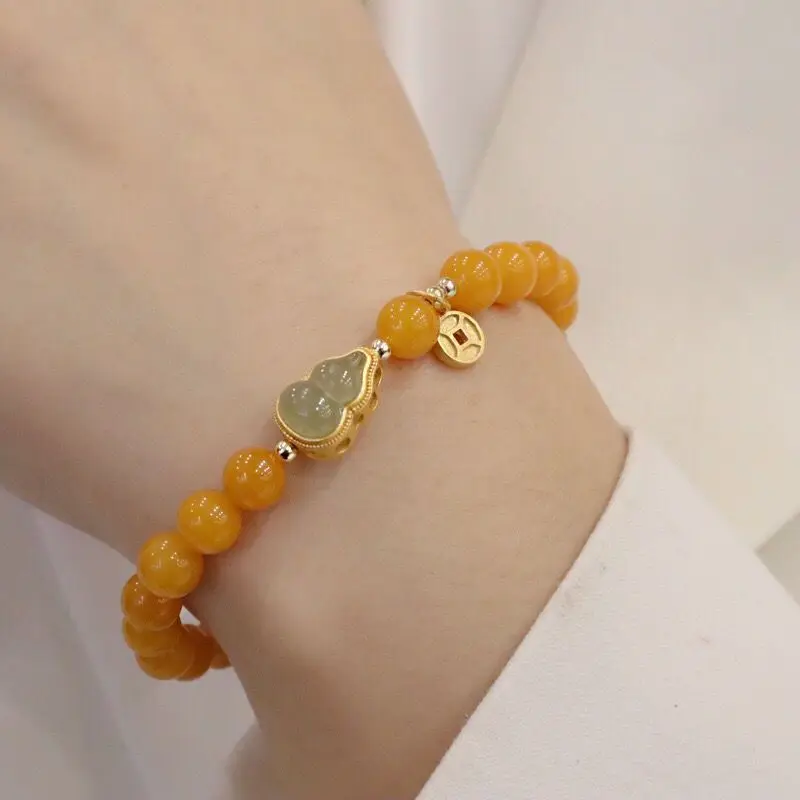 

SNQP Natural Honey Wax Bracelet Female Old ChiCken Oil Yellow Hotan Jade Gourd Zhaocai Nafulu Antique Round Bead