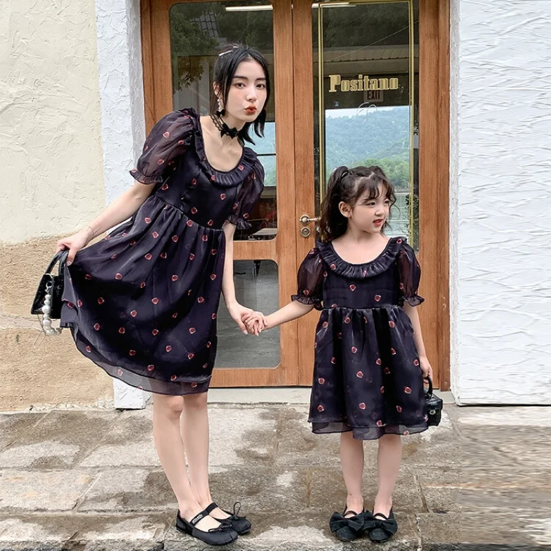 

Mom and daughter dress 2023 New in Family matching clothes Summer Black floral dress with puffy sleeves Kids Clothes girl