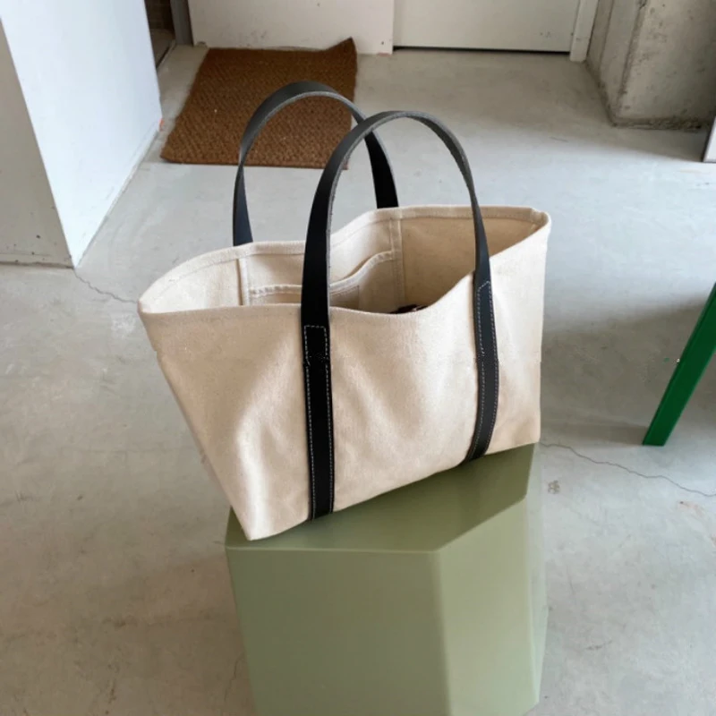 

Large-capacity Portable Shoulder Shopping Bag Spring And Summer All-match Simple Portable Canvas Bag Leather Stitching Tote Bag