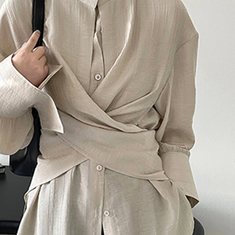 Блузка женская с круглым вырезом и длинным рукавом однобортная