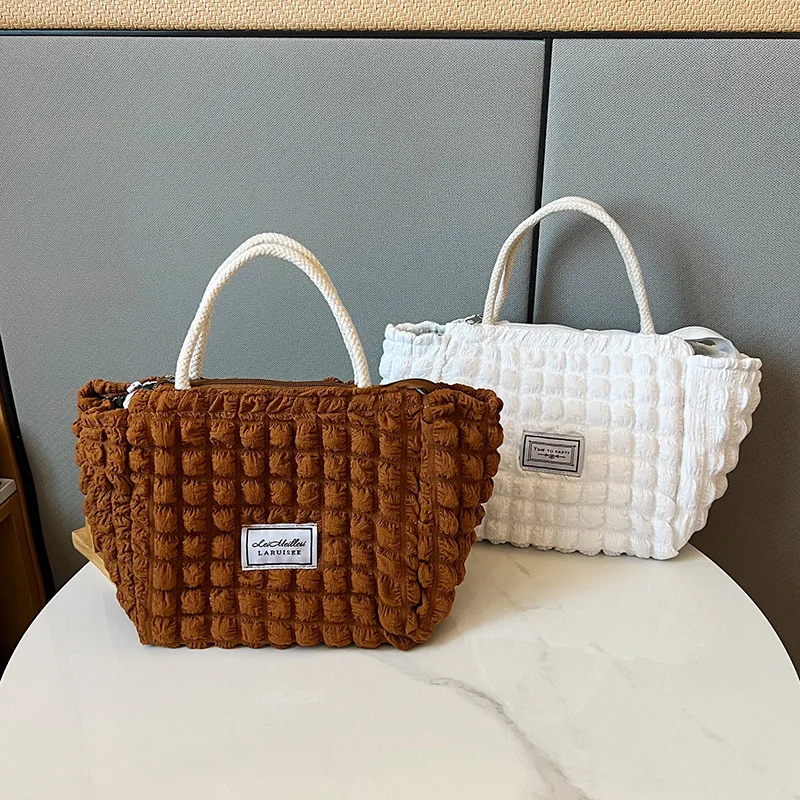 

Puff bag, women's cloud pleated handbag, 2023 new insulated portable lunch box bag, bento bag, storage bag, trendy