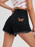 butterfly embroidered raw hem denim shorts