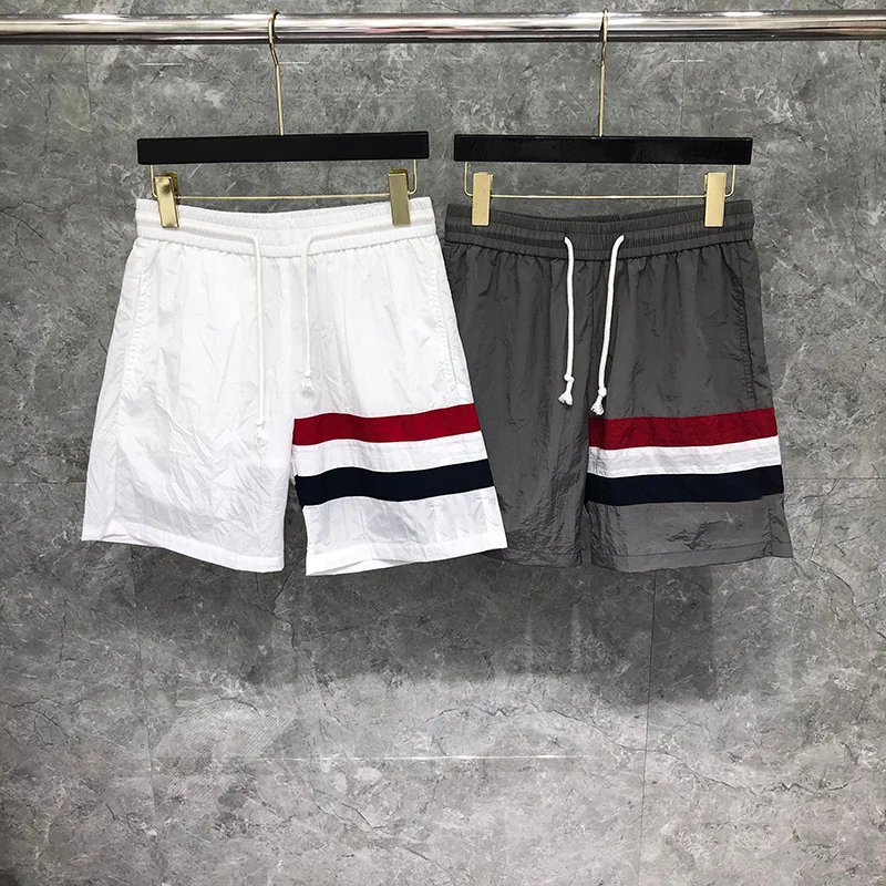 

TB THOM Shorts Summer Male Shorts Fashion Brand Men's Shorts Interlocking RWB Stripe Mid-Thigh Thin Qucik Dry Board Shortpants