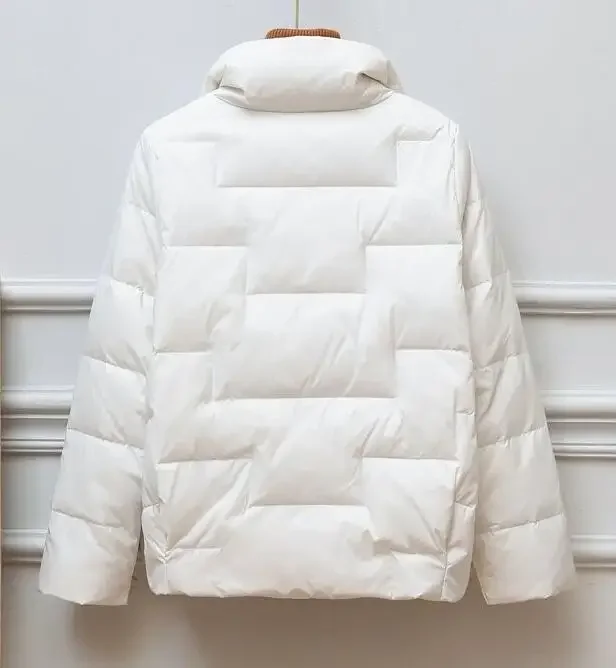 Стильный женский черно-белый зимний теплый однобортный пуховик с лацканами