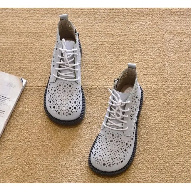 

The new 2023 Europe and the United States Xia Jiping round head with short boots short tube hollow out Martin boots boots