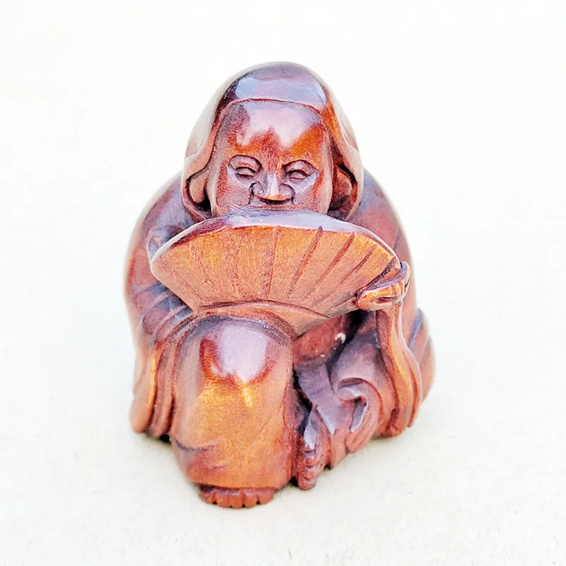 

Фигурка нэцукэ из самшита, гейша с веером