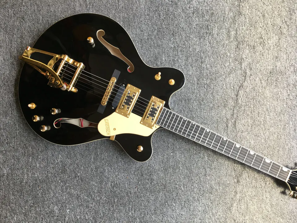 

Custom jazz guitar, double f-hole hollow body, ebony fingerboard, maple body vibrato system guitar