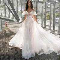 mqupin v neck wedding dress organza spaghetti straps open back button long ruffle sleeves tulle sequins