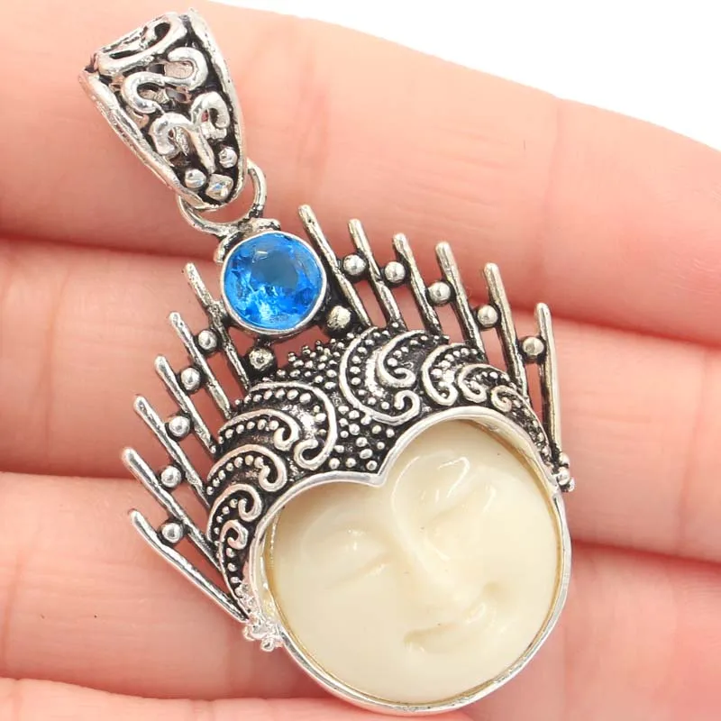 Кулон серебряный с изображением рубина перидота голубого топаза 12 г 50 х31 мм |