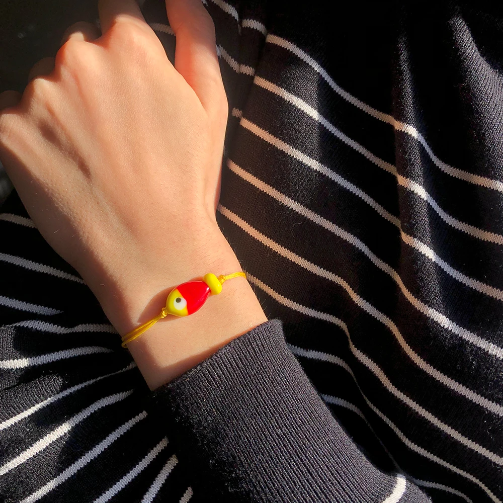 

Yellow Red Glass Fish Bracelet
