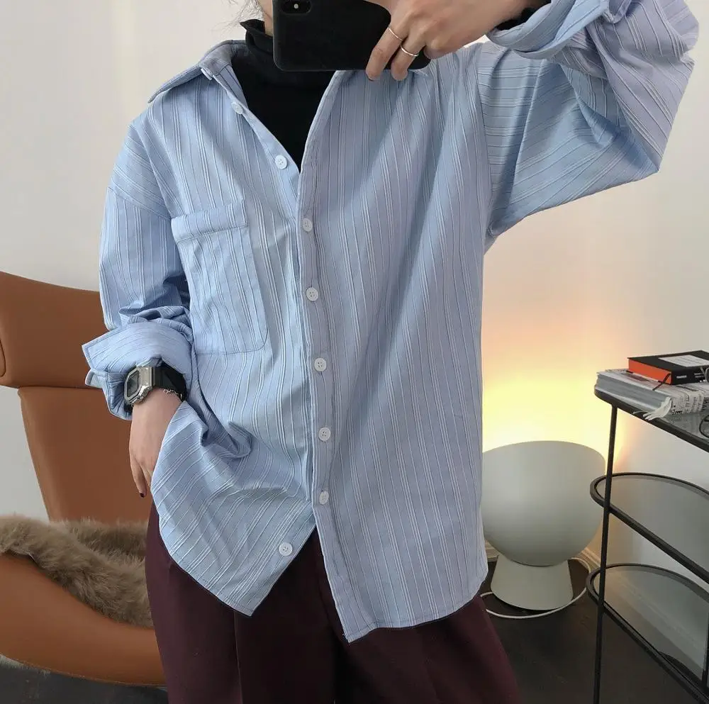 

Женская хлопковая рубашка светло-голубого цвета в полоску (плетение)