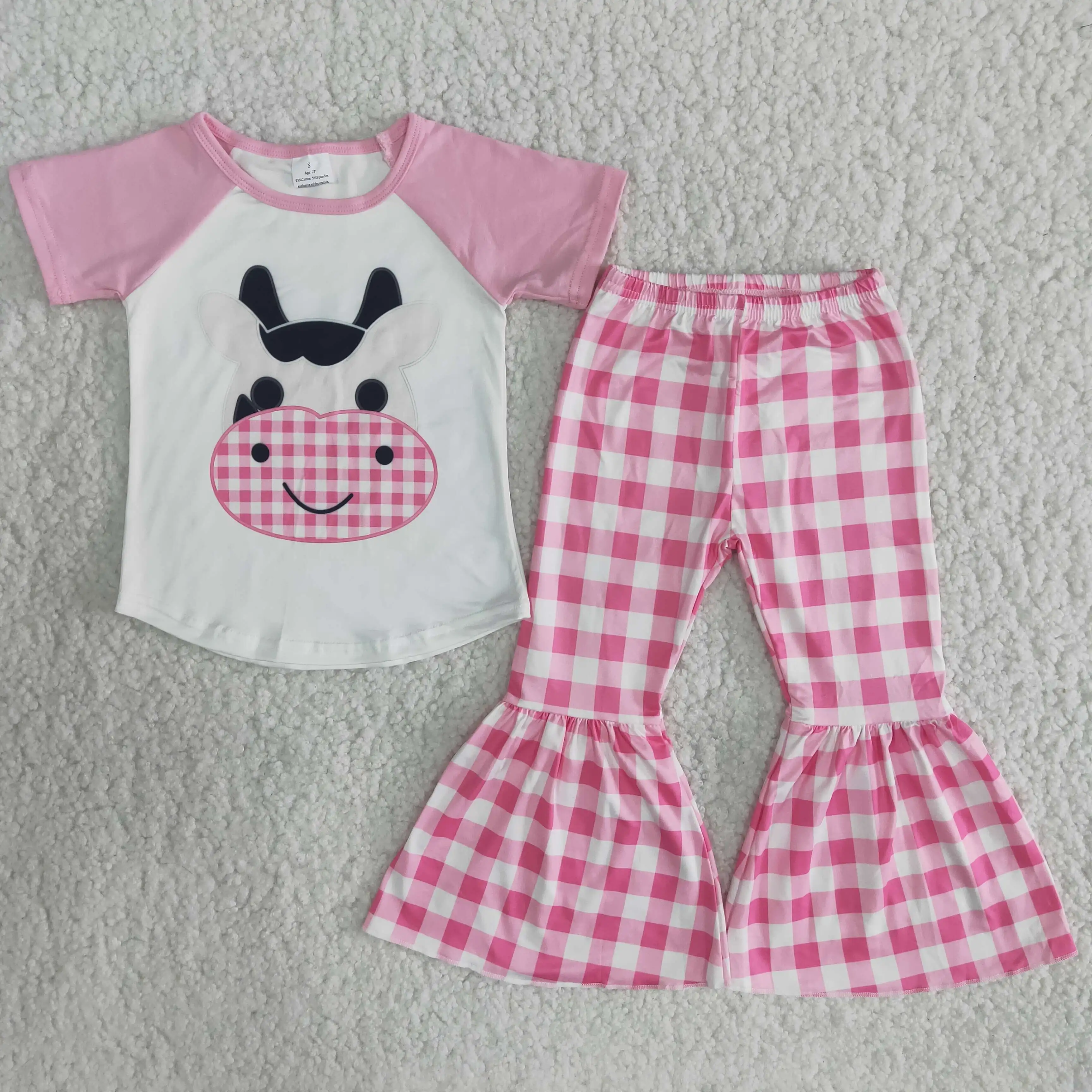 

Cute spring child girl cartoon cow print pink plaid fashion bell bottom pants