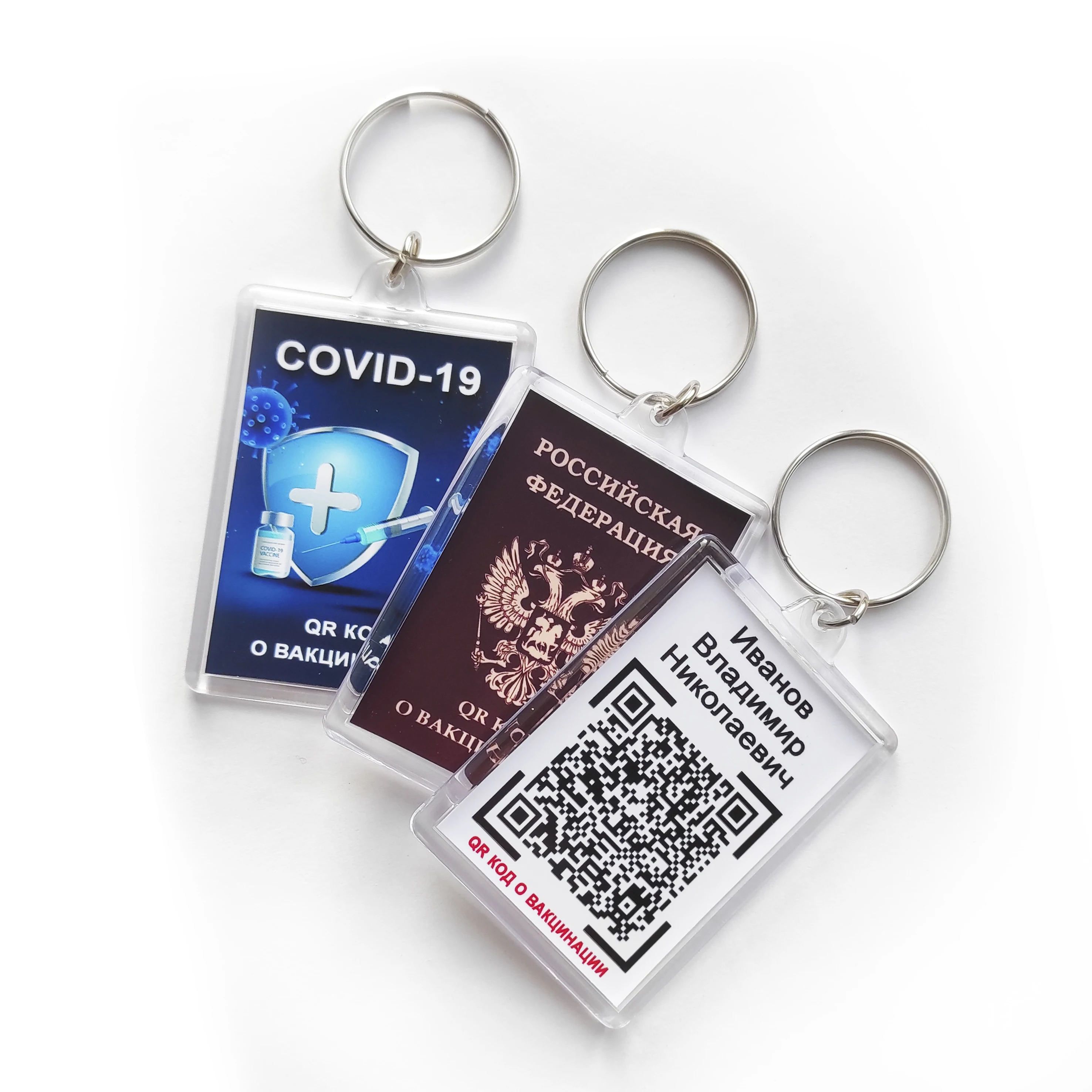Keychain with QR code about vaccination and photo. Custom keyring. Vaccination. code. Keyring. a state number. |