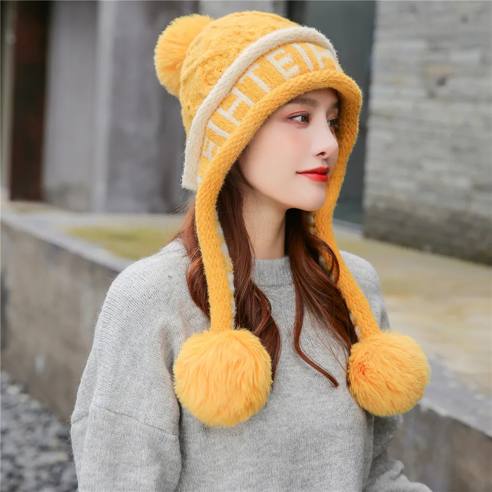 

2020 New Women's Pompom Ball Cute Hat Knit Plush Faux Rabbit Fur Hats Winter Windproof Warm Ear Protect Bomber Russian Caps