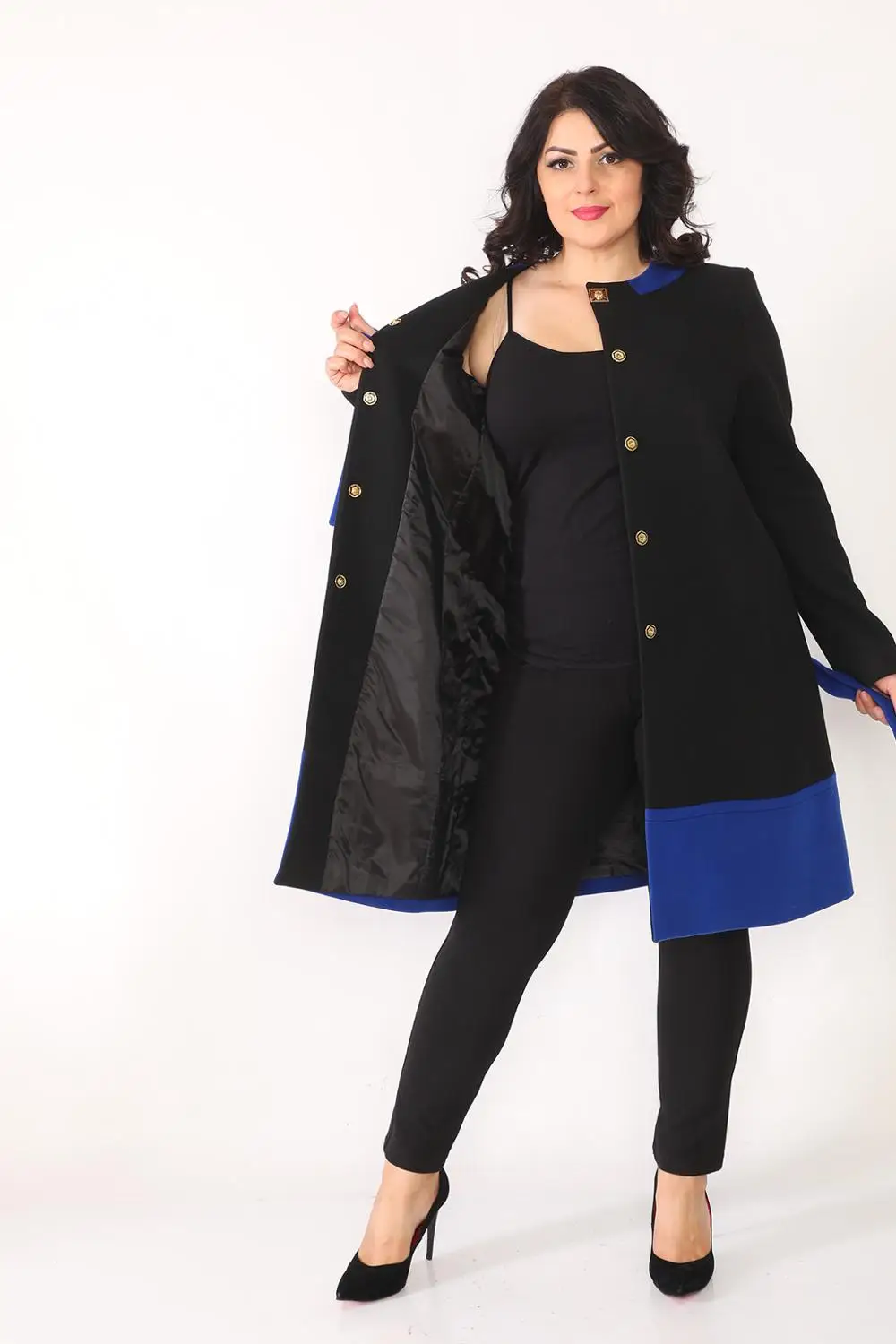 

Kadn Siyah ve Saks Biyeli Brolu Byk Beden Kae Kaban