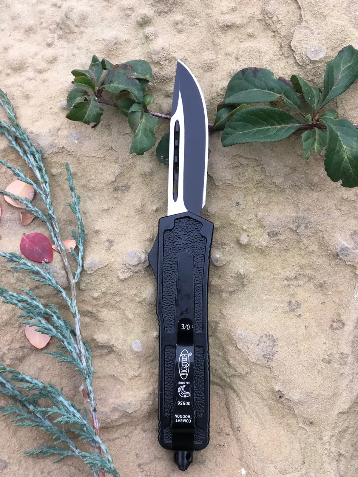 Фронтально выкидной нож microtech Волк