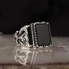 Мужское кольцо из серебра 925 пробы с гравировкой в виде ручки из оникса
