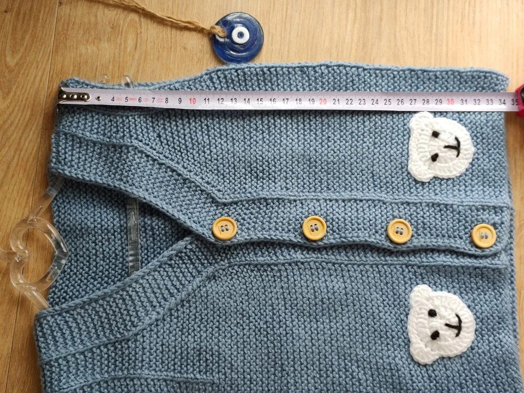 

HAND KNITTED BABY VEST 100% WOOL