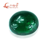 oval shape flat back cabochon grown hydrothermal emerald green color including minor cracks inclusions loose gem stone
