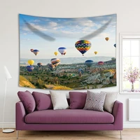 tapestry colorful hot air balloons over valley volcanic mountains goreme national park cappadocia turkey blue lime green