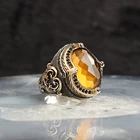 Мужское кольцо из серебра 925 пробы с желтым кварцем и кристаллом
