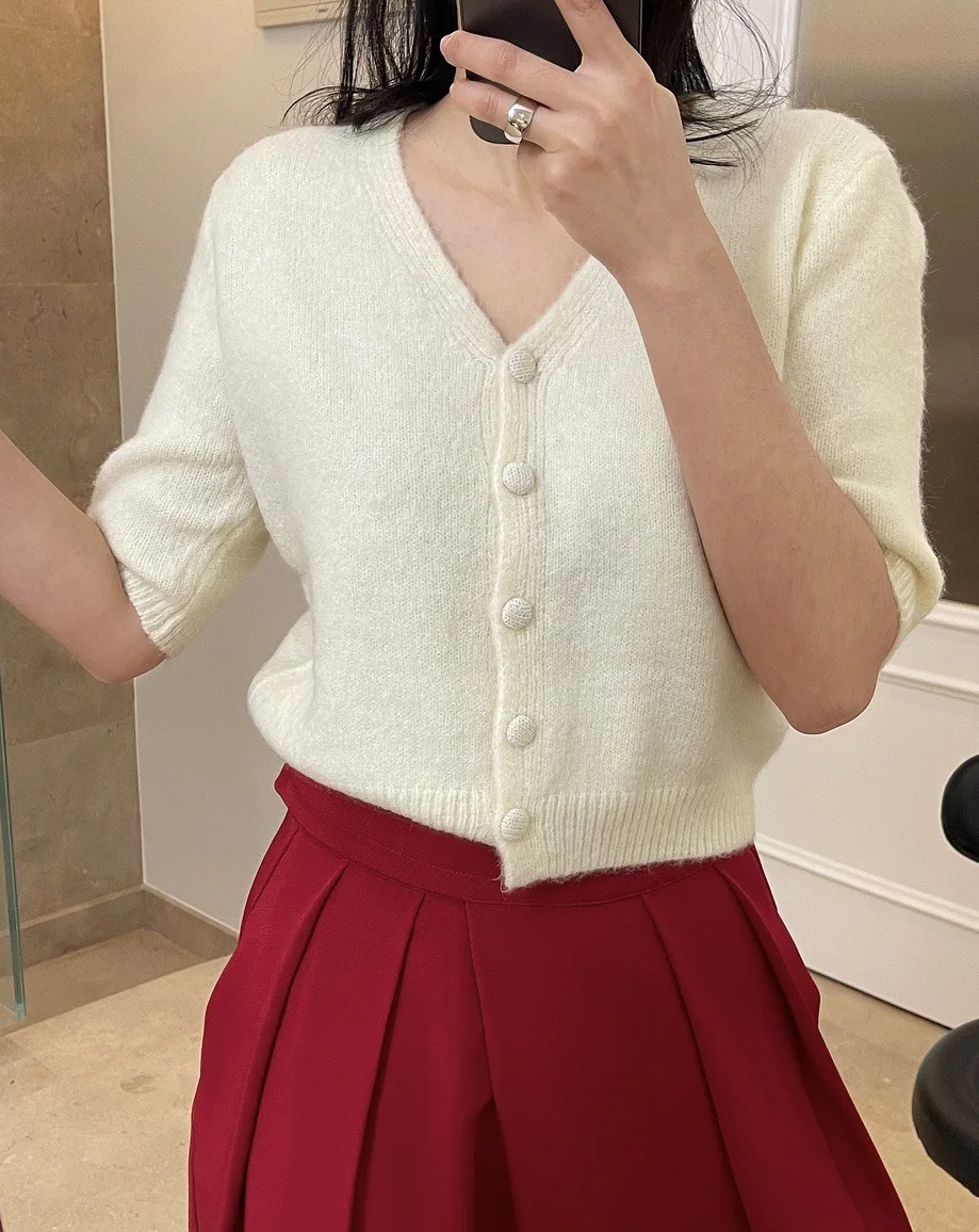 

Новый женственный короткий кардиган с мелкими пуговицами