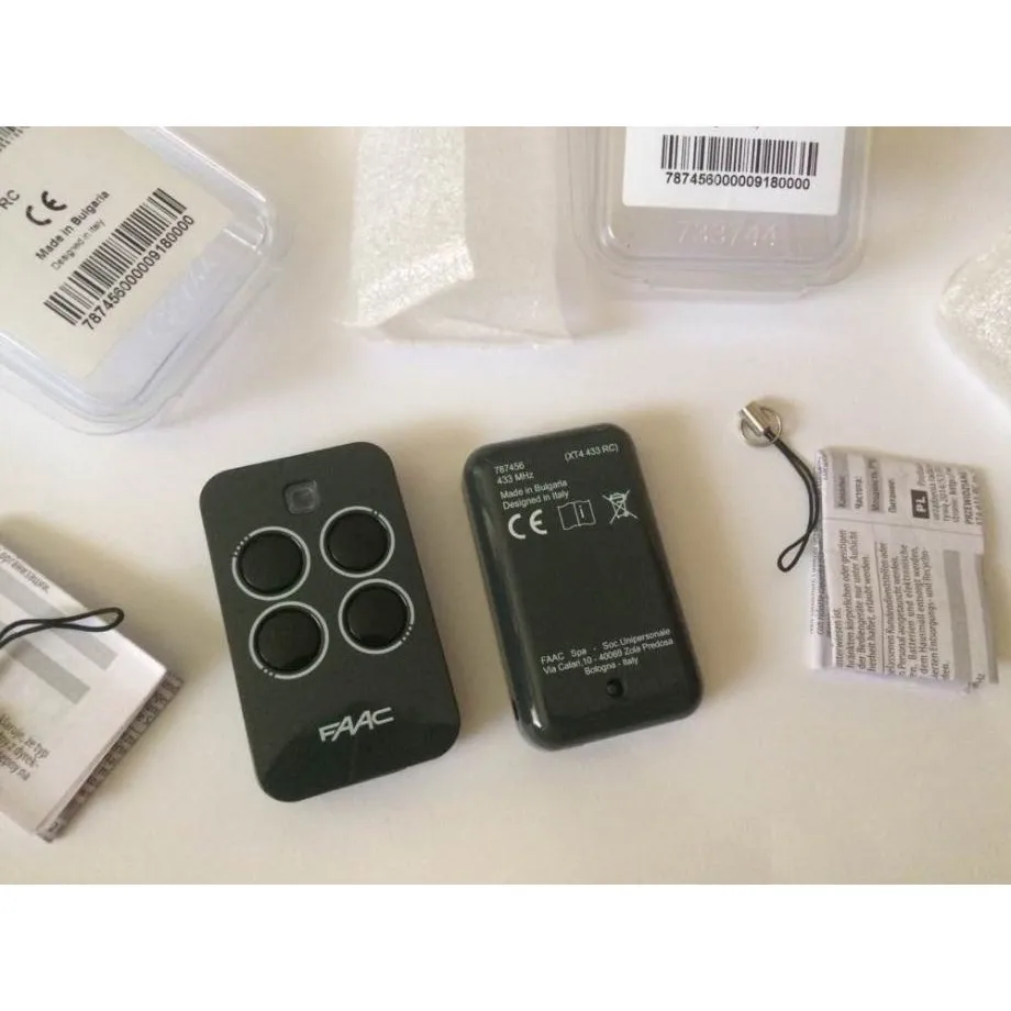 Пульт дистанционного управления FAAC XT4 433 RC с четырьмя каналами МГц и тёмно-серым корпусом (замена для артикула 787454).