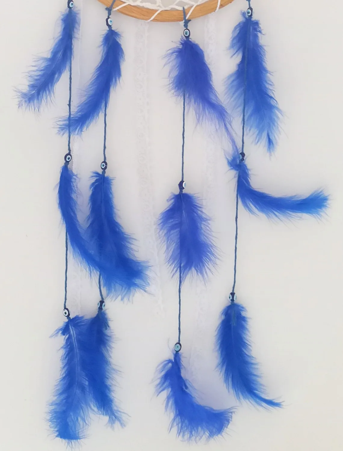 

Decorative Dreamcatcher Wall Ornament with Evil Eye Bead Knitted with Handcrafting