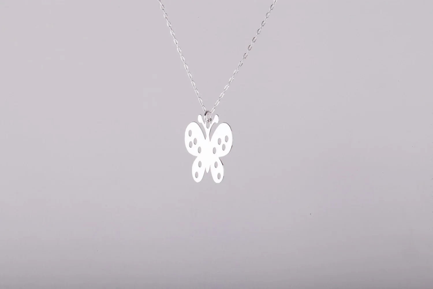 

UM US JEWELRY 925 Sterling Butterfly Pattern Ghost Pendant