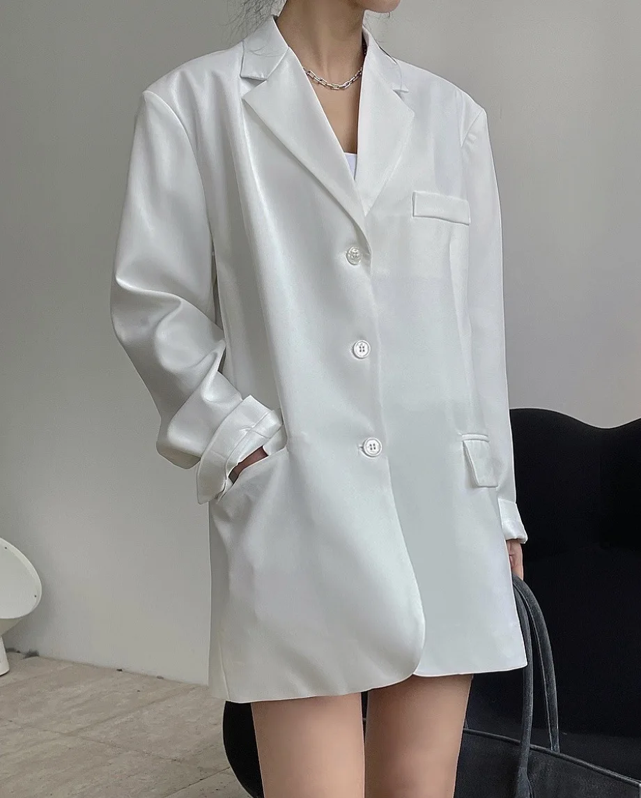 

woman white classic oversized jacket