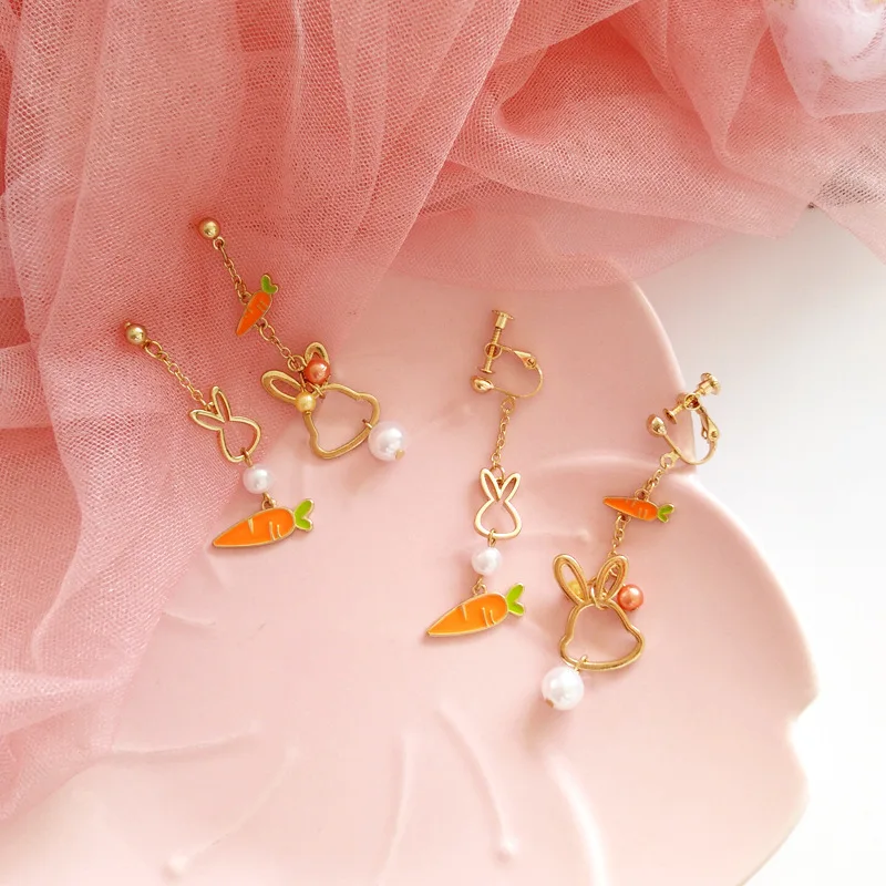 

Hollow rabbit carrot pearl asymmetric earrings earrings women