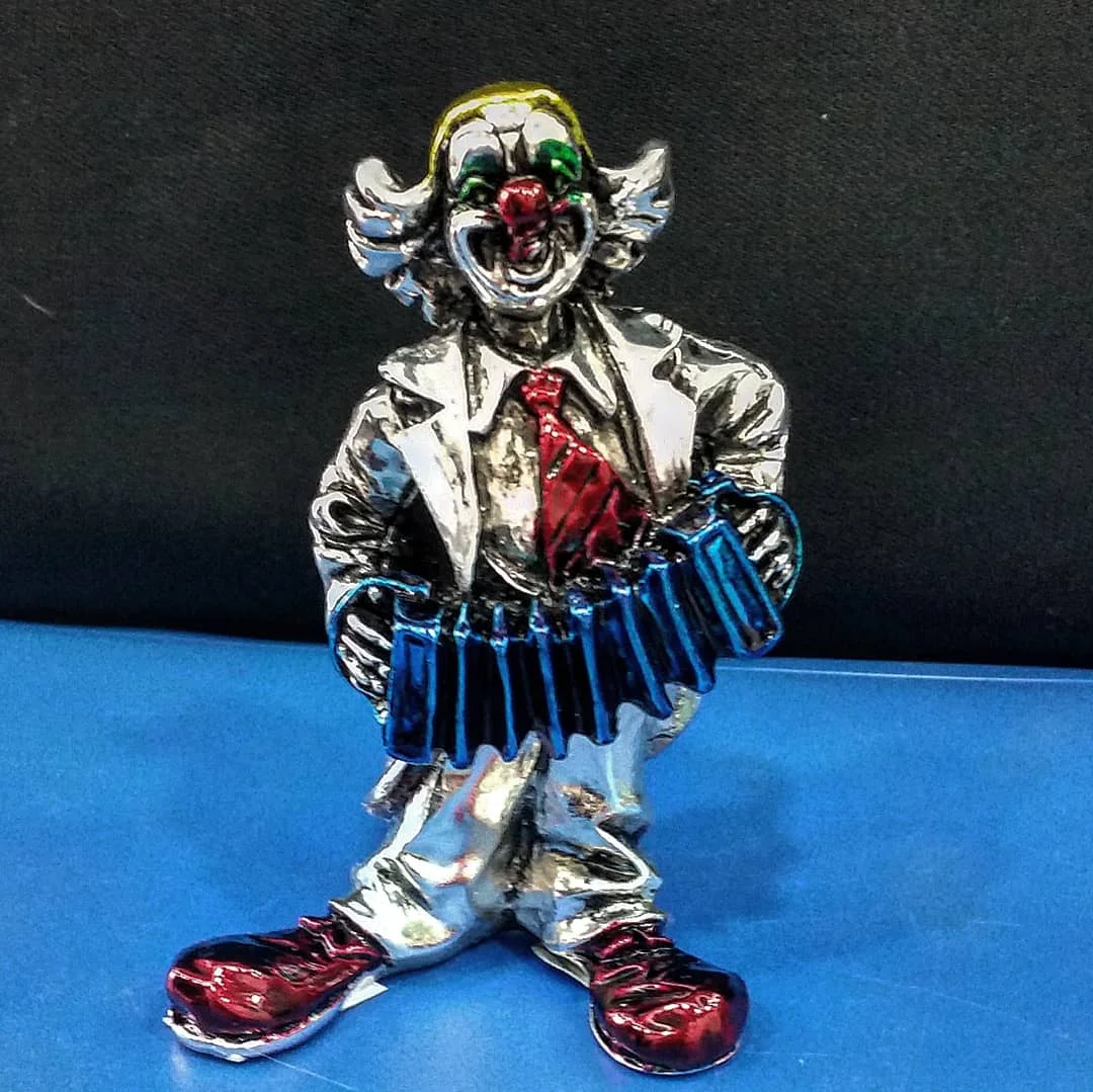 

925 Sterling Silver Plated Tiny Clown Playing Accordeon