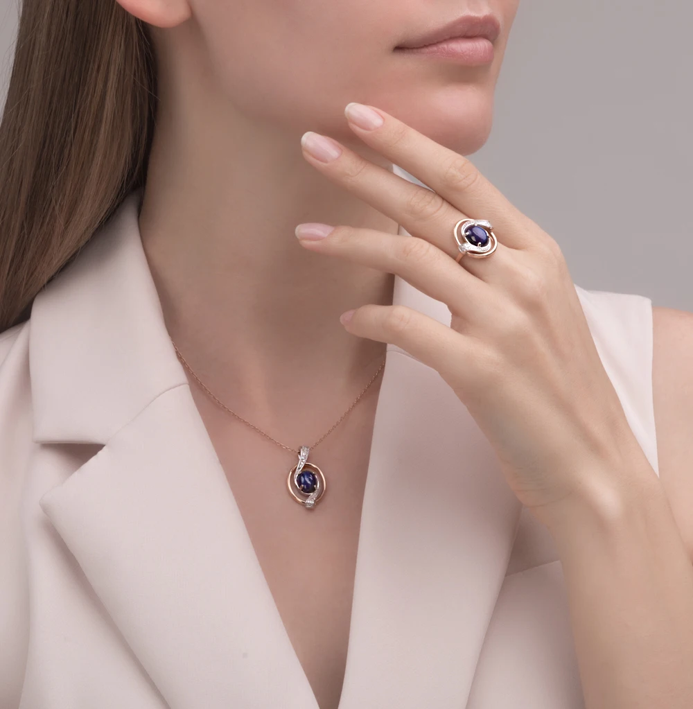 Золотое кольцо с звездчатым сапфиром и бриллиантами SUNLIGHT проба 585 | Украшения