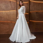 Платье свадебное атласное без бретелек, съемный кружевной жакет с рукавом до локтя, с бантом, винтажное сдержанное, простой наряд на заказ