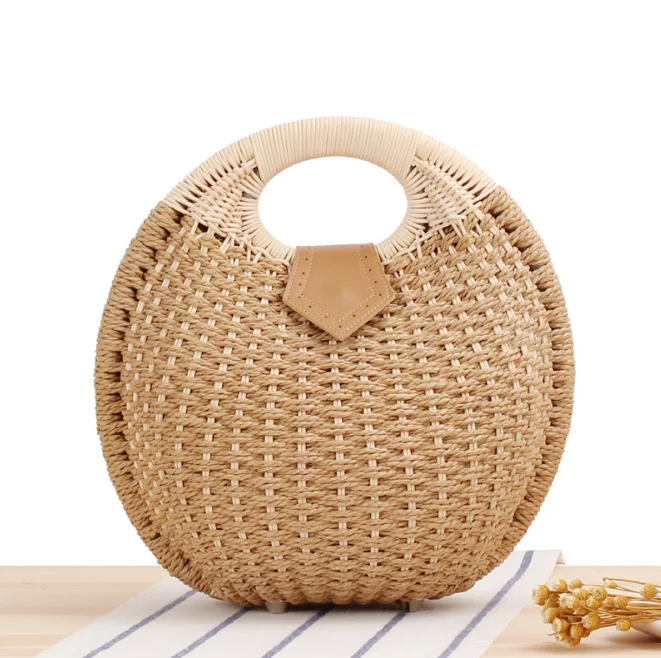 

New fashion shell handbag individual character lovely cane makes up hand wrap straw to make up a bag to weave female bag to rela