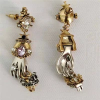 european and american retro hand crown skull colored gemstone fashion temperament earrings for women