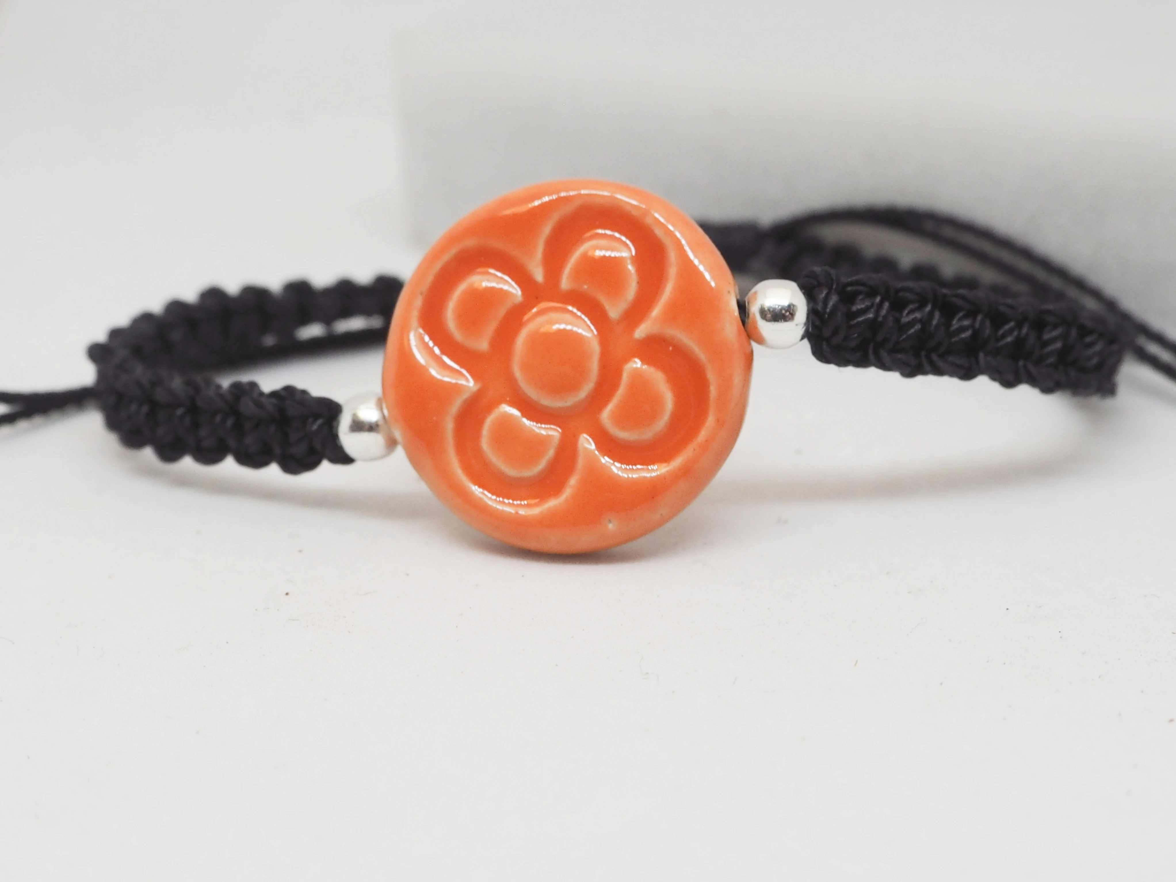 Темно-оранжевый браслет Panot с изображением цветов Барселоны. Женские браслеты.