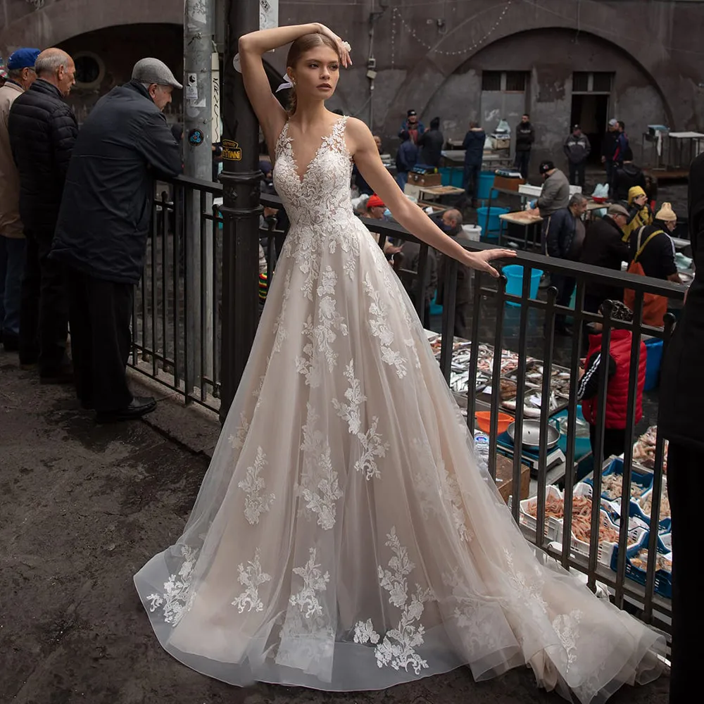 

KapokDressy Sexy Tulle A-Line Wedding Dresses Backless V Neck Off Shoulder Appliqued Sequined 2021 New Arrival Bridal Gowns