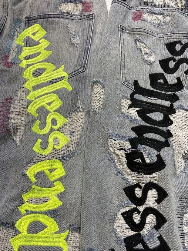 Streetwear Hole Retro Denim Jeans Men Women 1:1High Quality  Black Fluorescent Green Funny Art Letter Embroidery Denim Trousers