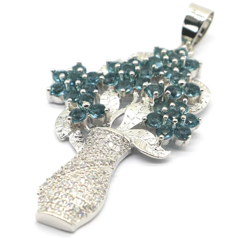 Большая роскошная ваза с зеленым Перидотом лондонским голубым топазом 57x29 мм