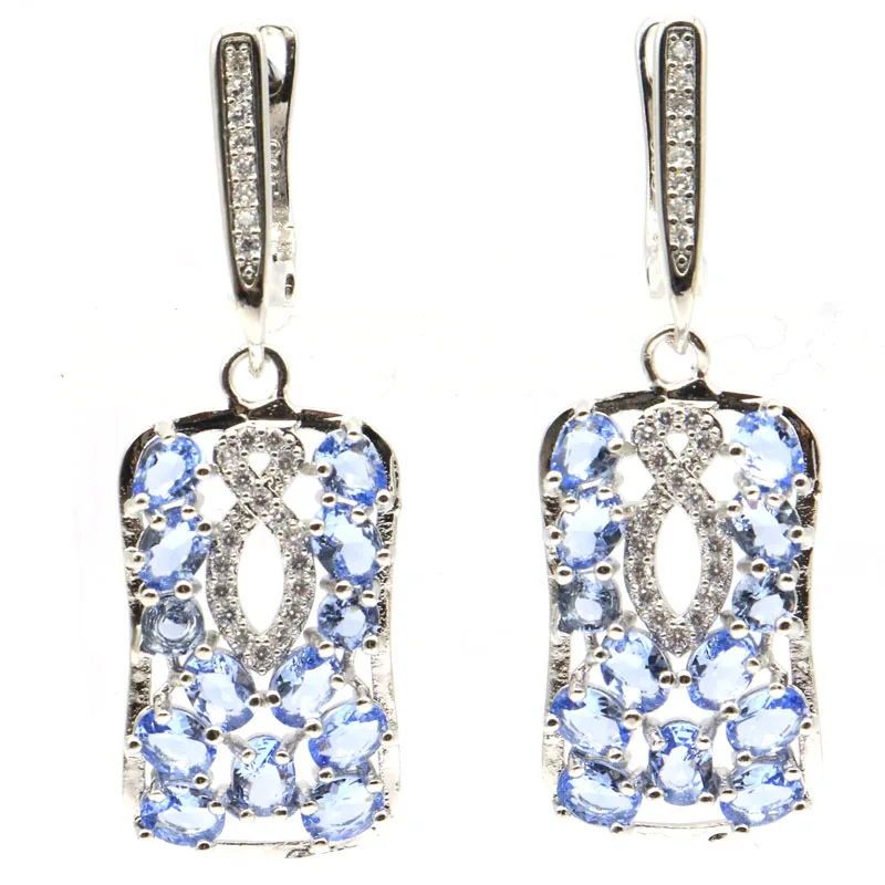 Женские серебряные серьги 38x14 мм с богатым синим фиолетовым цирконом белый